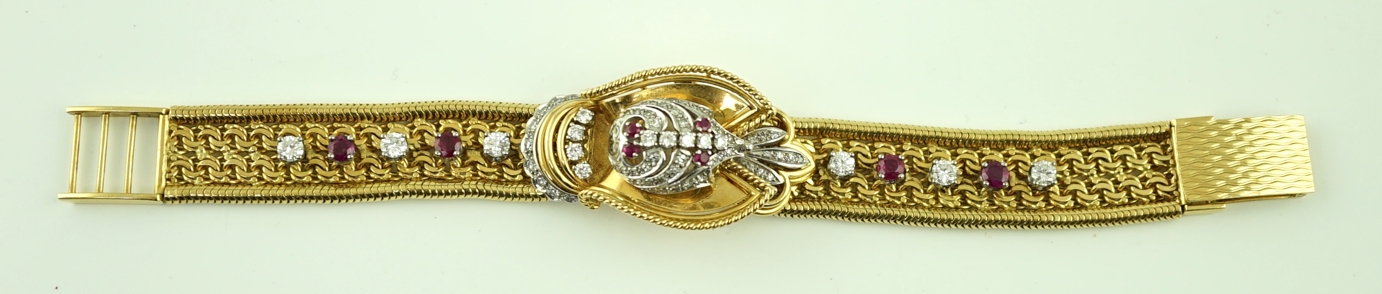 A lady's 18ct gold, ruby and diamond cluster set Rolex manual wind cocktail watch